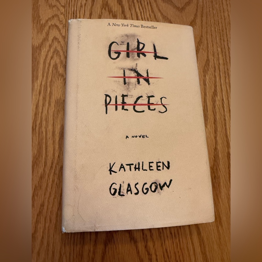 Girl in Pieces Hardcover Book